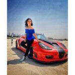 Ashnoor Kaur Instagram - Don’t sit at the passenger’s seat, Take the steering wheel of your life💙 . 1 or 2? . #DubaiDiaries #porsche #Lovemylife #lovemywork #actor #MeriGalti #AshnoorStyleDiaries #Blue #RedPorsche Styled by @dhartigulati Dubai, United Arab Emirates