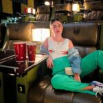 Avneet Kaur Instagram - I come to the theatre for popcorn and coke 🤪❤️ Top- @hersheinbox Pants- @urbanic_in Jacket- @lovegen_official Shoes- @nike Bag- @accessorizeindiaofficial 📸- @krupalakhanii.16 Jio World Drive
