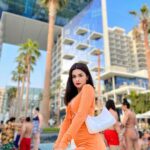 Avneet Kaur Instagram - I’m Prada, you’re na da 😛🧡🌈 Wearing- @srstore09 Bag- @prada FIVE Palm Jumeirah Dubai