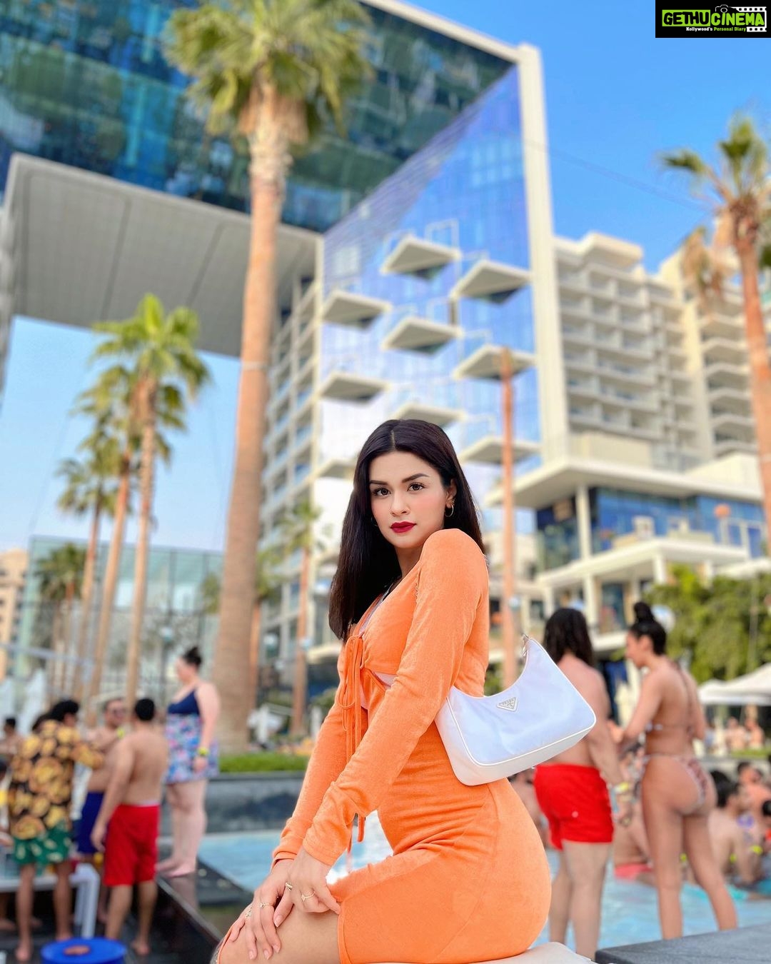 Avneet Kaur Instagram - I’m Prada, you’re na da 😛🧡🌈 Wearing- @srstore09 Bag- @prada FIVE Palm Jumeirah Dubai