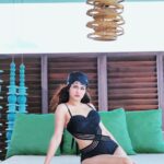 Avneet Kaur Instagram - Sitting real pretty.🖤 Stylist: @styling.your.soul Swimwear: @hottcurves.beachwear