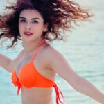 Avneet Kaur Instagram - 🧡☀️ Hair: @styleebyv Lens: @swaticosmetics Maldives