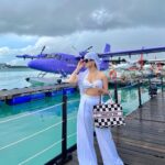 Avneet Kaur Instagram - Create a life you don’t need a vacation from.🤍🌊✈️☁️ #maldives #maldivesseaplane #travelwithak #seethesorldwithak Outfit : @risate_apparels @stylingcityy Bag : @dior Shades : @versace Shoes : @nike Maldives