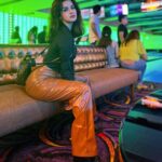 Avneet Kaur Instagram - Baller.👅🖤🎳 Wearing- @urbanic_in Bag- @louisvuitton Boots- @zori.world 📸- @anshulvarshnay