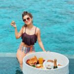 Avneet Kaur Instagram - Croissant and 🍾 kinda days….🌊🥐💫 Stylist : @styling.your.soul Swim suit: @swimwearindia_shop 🕶- @miumiu Maldives