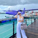 Avneet Kaur Instagram - Create a life you don’t need a vacation from.🤍🌊✈️☁️ #maldives #maldivesseaplane #travelwithak #seethesorldwithak Outfit : @risate_apparels @stylingcityy Bag : @dior Shades : @versace Shoes : @nike Maldives