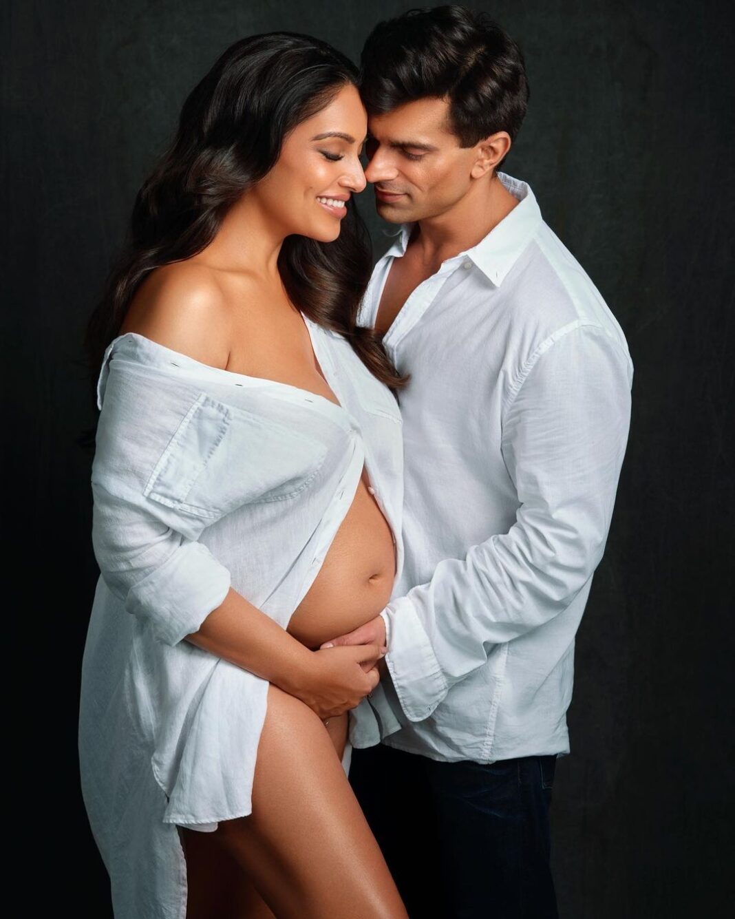 Bipasha Basu Instagram - 🔱
A new time, a new phase, a new light adds another unique shade to our prism of life. Making us a little more whole than we used to be.
We began this life individually and then we met each other and from then we were two.
Too much love for only two, seemed a little unfair for us to see…so soon, we who once were two will now become three.
A creation manifested by our love, our baby will join us soon and add to our glee😄❤️
Thank you all, for your unconditional love, your prayers and good wishes as they are and will always be a part of us. Thank you for being a part of our lives and manifesting with us another beautiful life, our baby🙏
Durga Durga🙏
Photographer- @prasadnaaik
Stylist- @rockystarofficial
Makeup - @anilc68
Hair- @hairbyykaushall Bipasha Basu Instagram - 🔱 A new time, a new phase, a new light adds another unique shade to our prism of life. Making us a little more whole than we used to be. We began this life individually and then we met each other and from then we were two. Too much love for only two, seemed a little unfair for us to see…so soon, we who once were two will now become three. A creation manifested by our love, our baby will join us soon and add to our glee😄❤️ Thank you all, for your unconditional love, your prayers and good wishes as they are and will always be a part of us. Thank you for being a part of our lives and manifesting with us another beautiful life, our baby🙏 Durga Durga🙏 Photographer- @prasadnaaik Stylist- @rockystarofficial Makeup - @anilc68 Hair- @hairbyykaushall
