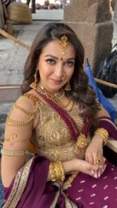 Catherine Tresa Instagram - This cinderella has different shoes😜 #https://youtu.be/aosg9hapID4 #actresslife #bts #bimbisara #behindthescenes #gottogetourfeetdirty #funny @ntrartsoffl @director_vassishta