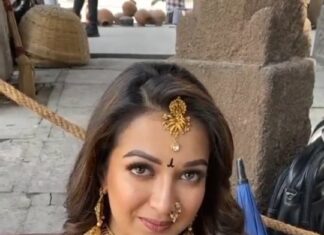 Catherine Tresa Instagram - This cinderella has different shoes😜 #https://youtu.be/aosg9hapID4 #actresslife #bts #bimbisara #behindthescenes #gottogetourfeetdirty #funny @ntrartsoffl @director_vassishta