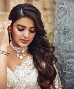 Nidhhi Agerwal Instagram - She was temptation wrapped in simple elegance 🤍🕊🦢🐚🍦🏹❤️‍🔥

Styled by: @nikhitaniranjan
Shot by: @livingin24fps 
Photography team: @anupamasindhia
Outfit: @roujeofficial 
Jewellery: @konikajewellery
Hair: @priyahairandmakeup_