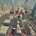 Parvatii Nair Instagram - Living on the edge !! The edge walk was super fun n super scary at the same time . At a height of 220 meters , this really made me feel like m on top of the world !@visitdubai @skyviewobservatory #dubaidestinations #dubai #dubailife #visitdubai Colors by @infinity_skylight Sky Views Observatory