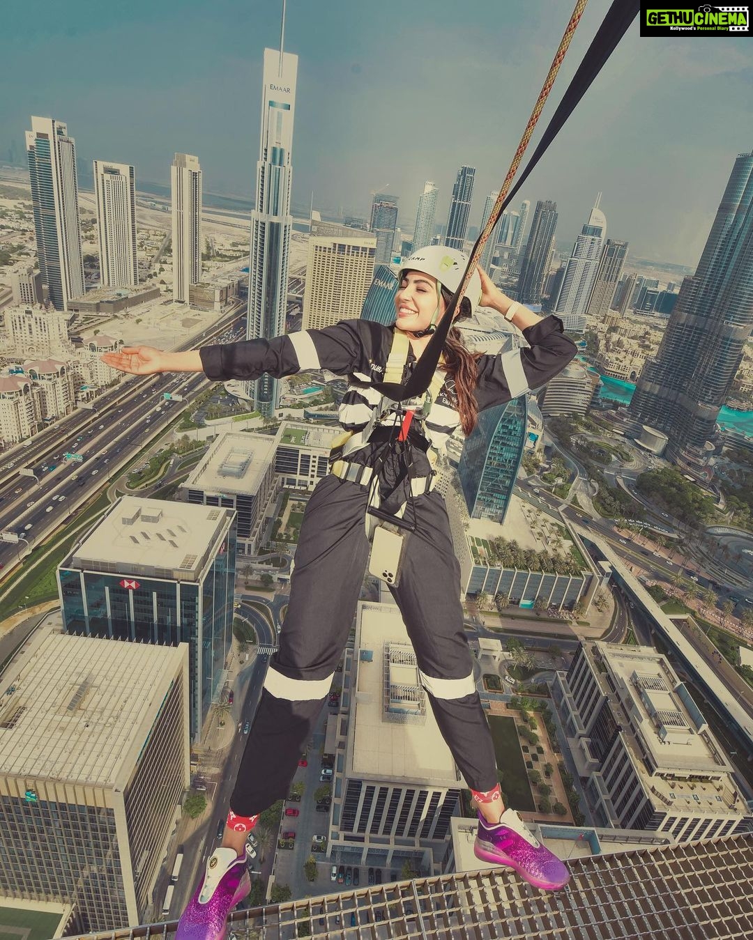 Parvatii Nair Instagram - Living on the edge !! The edge walk was super fun n super scary at the same time . At a height of 220 meters , this really made me feel like m on top of the world !@visitdubai @skyviewobservatory #dubaidestinations #dubai #dubailife #visitdubai Colors by @infinity_skylight Sky Views Observatory