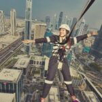 Parvatii Nair Instagram - Living on the edge !! The edge walk was super fun n super scary at the same time . At a height of 220 meters , this really made me feel like m on top of the world !@visitdubai @skyviewobservatory #dubaidestinations #dubai #dubailife #visitdubai Colors by @infinity_skylight Sky Views Observatory