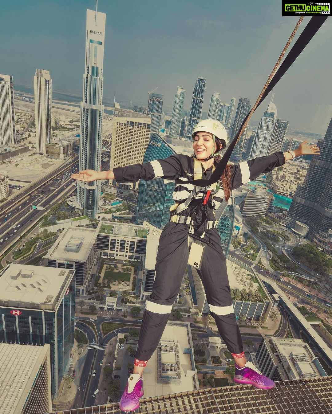 Parvatii Nair Instagram - Living on the edge !! The edge walk was super fun n super scary at the same time . At a height of 220 meters , this really made me feel like m on top of the world !@visitdubai @skyviewobservatory #dubaidestinations #dubai #dubailife #visitdubai Colors by @infinity_skylight Sky Views Observatory