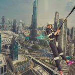Parvatii Nair Instagram - Living on the edge !! The edge walk was super fun n super scary at the same time . At a height of 220 meters , this really made me feel like m on top of the world !@visitdubai @skyviewobservatory #dubaidestinations #dubai #dubailife #visitdubai Colors by @infinity_skylight Sky Views Observatory