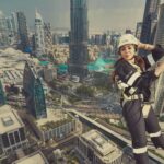 Parvatii Nair Instagram - Living on the edge !! The edge walk was super fun n super scary at the same time . At a height of 220 meters , this really made me feel like m on top of the world !@visitdubai @skyviewobservatory #dubaidestinations #dubai #dubailife #visitdubai Colors by @infinity_skylight Sky Views Observatory