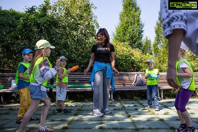 Priyanka Chopra Instagram - An aspect that is not often discussed but is very prevalent in a time of crisis is the psychological impact on refugees. I met with so many women and children who are trying to cope with the horrors they have witnessed in this war. @unicef responded in Poland and in the region by ensuring that teams of psychologists are available to help mothers and children at the Blue Dot centres, the Child Development centres, the Education Hubs and other touch points. One of the most effective tools in helping children regain a sense of normalcy is playful interaction. It sounds so simple, but through play, children can find safety and respite, while also being able to explore and process what is happening in their lives. When children are driven from their homes by war, conflict, or displacement of any kind, access to nurturing relationships with parents, caregivers, and peers are critical buffers to the effects of violence, distress, and other adverse experiences. The kids I met on this mission love working with art. Coffee beans, salts and regular household items are used for art therapy and sensitivity therapy. When they work with different materials, as well as paints and colors, the therapists are able to understand their emotions. In the beginning for example, the children would draw with very dark colors, and over time the colors got brighter. Another example is handmade dolls that I was gifted by Ukrainian children at each Programme I visited with Unicef. Each is unique and is believed to have the power of protection, which these children really need right now as the war is upending the lives and futures of the countries 5.7 million school aged children. 📷 @vtremeau Warsaw, Poland