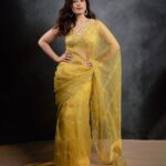 Raashi Khanna Instagram - Yellow, yellow, one happy fellow! 😬💛 #thiruchitrambalam audio launch Wearing: @meghabansalofficial Jewellery: @vandalsworld_unofficial @mahesh_notandass Styled by @archamehta Team: @poorvjainn Makeup @adhishreep Hair @arvindkumar_hair Photographed by @kiransaphotography