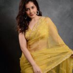 Raashi Khanna Instagram - Yellow, yellow, one happy fellow! 😬💛 #thiruchitrambalam audio launch Wearing: @meghabansalofficial Jewellery: @vandalsworld_unofficial @mahesh_notandass Styled by @archamehta Team: @poorvjainn Makeup @adhishreep Hair @arvindkumar_hair Photographed by @kiransaphotography