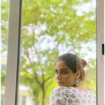 Samyuktha Menon Instagram - Peek-a-boo at the windows to my soul 💚 Captured by @faizsiddik ❤️ #peekaboo #windows #soul #iamsam #talesofsam #samoninsta #heythere #sayhello #sayhi #coloursofinsta #instamood #floral #white #huesoflife #musings #standstill #breathe #wowsome #finding #searching #epic #instadaily #photooftheday #instaclouds #flyhigh