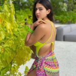 Sara Ali Khan Instagram - Don't judge each day by the harvest you reap but by the seeds that you plant 🪴🌳🌴💚 👙: @stylebyami accessories: @sara_vaisoha . .. … .. . @ncstravels @patinamaldives #PatinaMaldives #collab