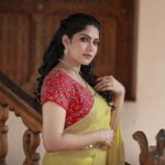 Swasika Instagram - When the wind played along with the drape and poses. Mua : @rosepetalsbridalmakeup Stylist : @rashmimuraleedharan Photographer @reshma_photography Saree : @ladies_planet_ Jewellery: @ladies_planet_rental_jewellery #swasika #swasikavj #yellowdrape #yellowlove #drapelove #sareelove #amritatv #redcarpet