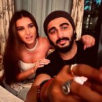 Tara Sutaria Instagram - When we’re not busy being Villains, we’re busy being absolute buffoons. Presenting our alter ego’s - Ami and Timi Masi. 👯‍♀️ And yes… the cheek pinching is a saga. 💁🏻‍♀️ @arjunkapoor