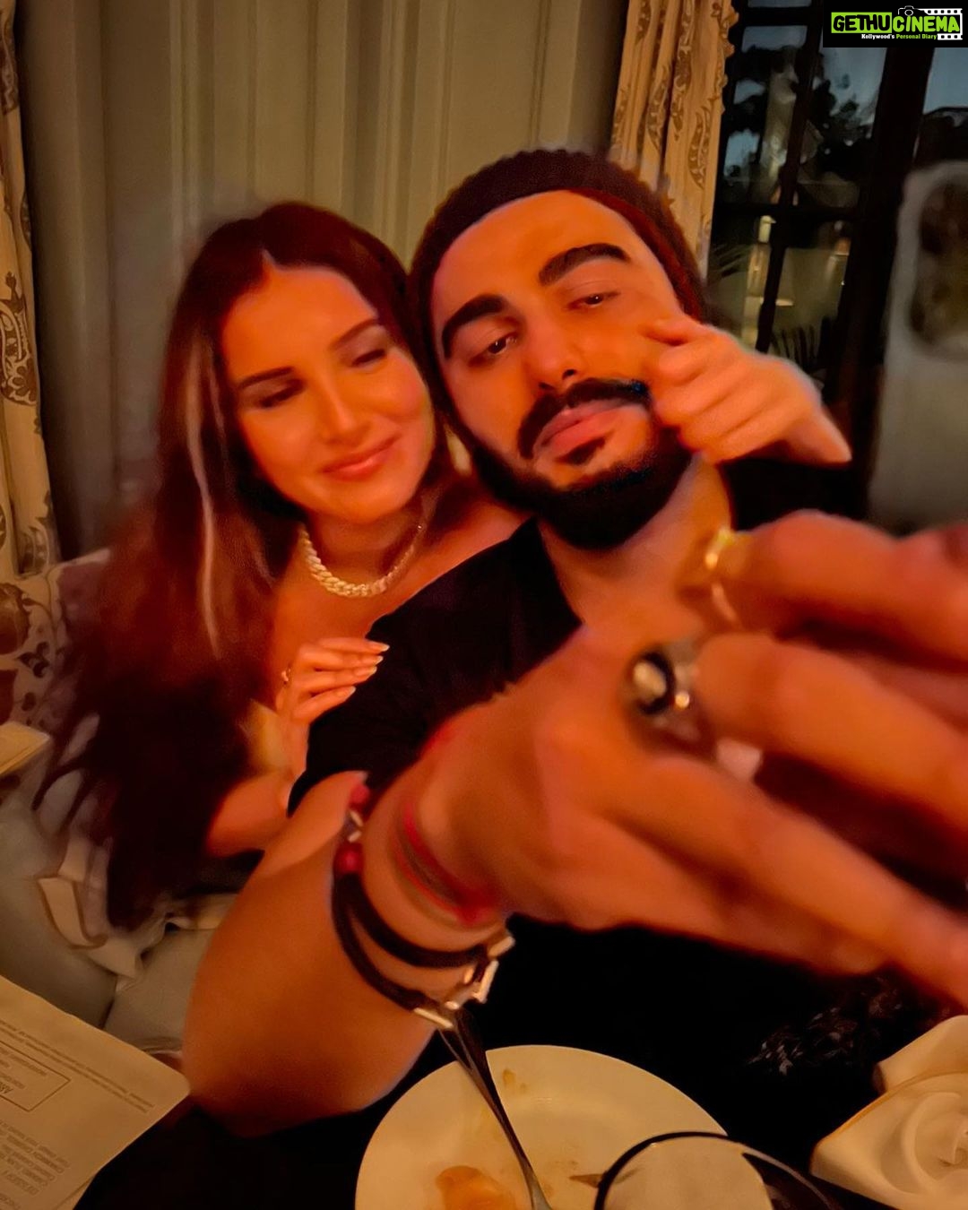 Tara Sutaria Instagram - When we’re not busy being Villains, we’re busy being absolute buffoons. Presenting our alter ego’s - Ami and Timi Masi. 👯♀️ And yes… the cheek pinching is a saga. 💁🏻♀️ @arjunkapoor