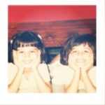 Tara Sutaria Instagram – The twin and I having one of our parties underneath the Diwan at home. You know, the usual. Circa 1998 🍼🎈🍭💛 #ParsiSwag