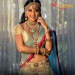 Tejasswi Prakash Instagram – Shri Paramani Jewels is here to make this gloomy season exciting for you by showcasing this colourful, vibrant NAVRATAN set with various pieces including choker, necklace, Rani haar, jhumkies, mathapatti, waist belt, and kadas worn by the ravishing beauty @tejasswiprakash 
The Big, bold pieces, all set in 22kt Gold, are sure to complement your ensemble this season!
.
Rejoice in the knowledge of our culture and heritage with this GRAND ATTIRE available only at @shriparamanijewels flagship stores: Khan Market and Aurobindo Market.
.
Jewellery by: @shriparamanijewels @vinay_shd @vinayanshu_pp
Location: @prideplaza
Managed by: @beamoreentertainment @sumitpuriya @eventsleela @madhurbhardwaj1202
.
#bridaljewellery #designerjewellery #templejewellery #bridalchoker #ranihaar #bridaljhumkis #chandbalis #vintagejewellery #bridaljewellerycollection #festivejewellery #Shriparamanijewels #jewellerylover #bridalstyle #affordablebridaljewellery #khanmarket #bollywoodjewellery #weddingcollection #Anshuvinay #mirarajputbridaljewellery #bajiraojewellery #amoreentertainment #leelaevents