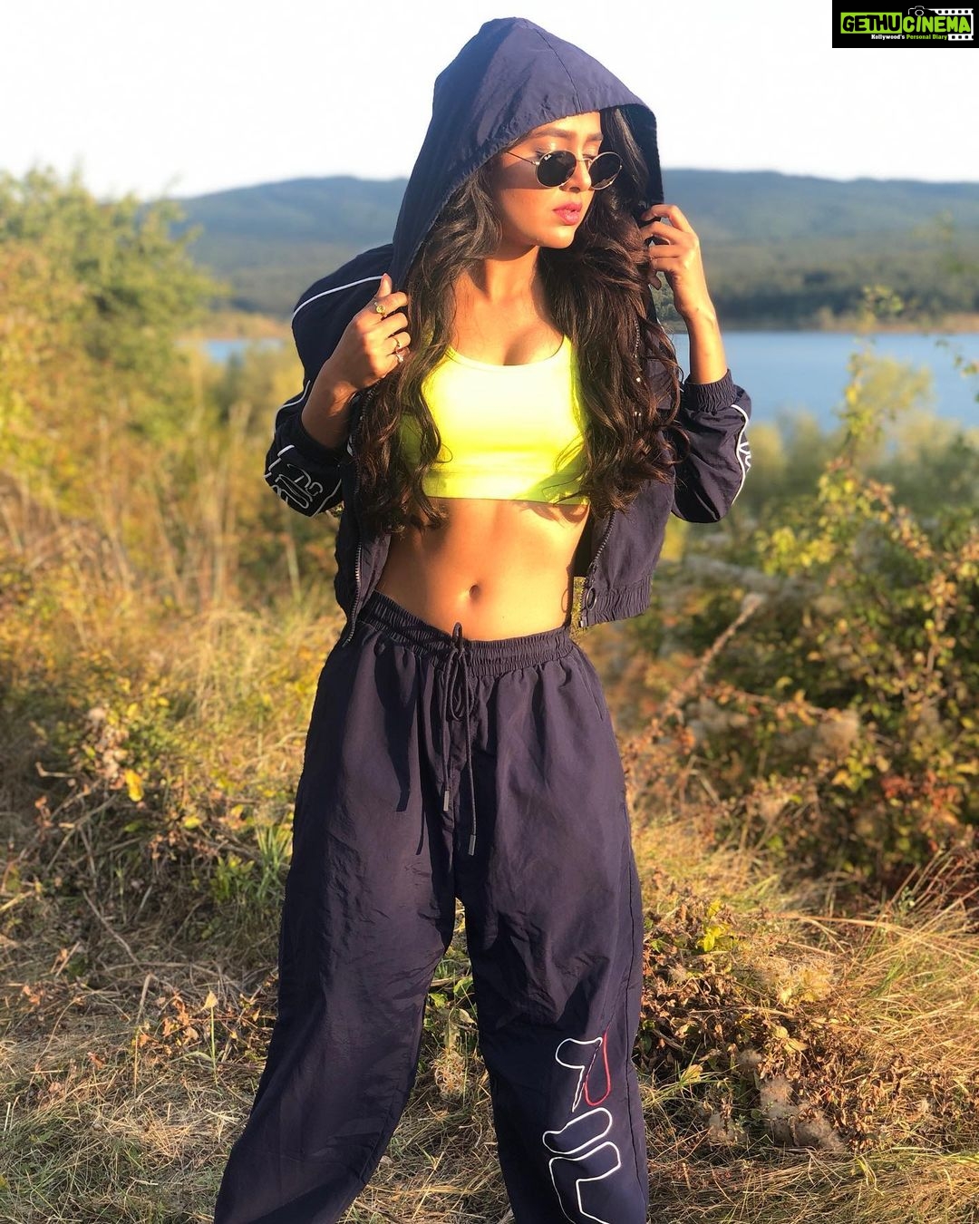 Tejasswi Prakash Instagram - So long as you fight the darkness...you stand in the light... . . Track suit @filaindia Sportswear @hm Styled by @saachivj Team @vanita_pari @sanzimehta777 @nancyshahh #sunkissed #travelholic #passion Sofia, Bulgaria