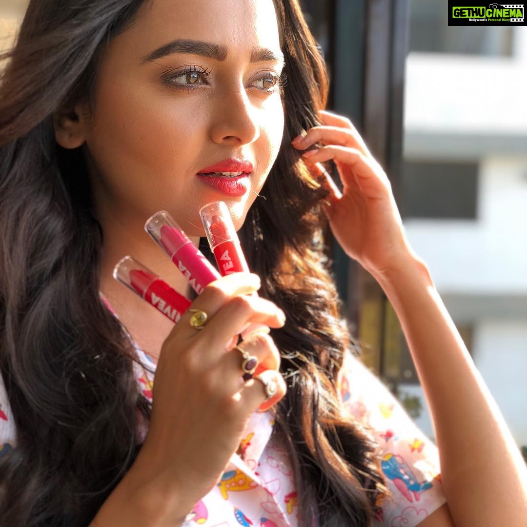 Tejasswi Prakash Instagram - Tried this life saviour new lip product... Brilliant at moisturizing and beautiful Color that doesn't let your glam go away! NIVEA COLORON Lip Crayon πππ... Available in three lovely shades Hot Pink, Pop Red and Coral Crush. The best part of the crayon is that it has a smooth, creamy easy glide texture and the color payoff can be increased with more swipes! #niveacrayoncolorandcare #getyourcoloron and if you wanna get it with discount use the coupon code tejs20 #niveaforyou The best part of nivea is that itβs long lasting and it changes shades with the number of coats you apply... Thank you @niveaindia @letspurplle for this beauty PC- @kunaljaisingh