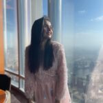 Tejasswi Prakash Instagram - Forever that girl that gets really excited when the Sky is in pretty colours ❤️ . . . Styled by: @camy1411 X @tejalnagmoti Outfit: @madaboutfashion_kejal . . . #pink #peace #high Burj Khalifa