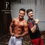 Tiger Shroff Instagram - ‪Behind the scenes @DabbooRatnani #dabbooratnanicalendar2018 #letsseeIfwetoppedlastyearshot #tonight ‬