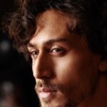 Tiger Shroff Instagram – If you want to make the world a better place take a look at yourself and make a change. #MJ #MunnaMichael #GQ 🙏😊