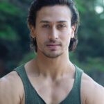 Tiger Shroff Instagram - Time truly flies! #Repost @teamtigershroff . . . Today marks 1 MONTH since the release of "#BAAGHI"! Here's an on-#Location #Throwback 💚 - #TigerShroff #ShraddhaKapoor #SabbirKhan #SajidNadiadwala