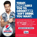 Tiger Shroff Instagram - Our restaurant workers do everything they can for us. Today, let’s do a little for them. I am contributing to the #PepsiSaveOurRestaurants program. You too can🤘 @pepsiindia @swiggyindia #NRAI