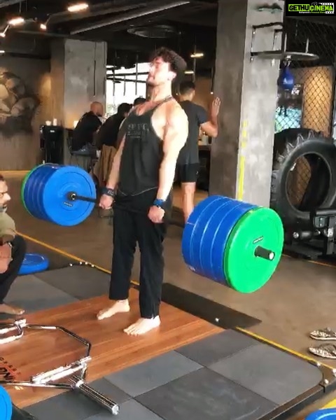 Tiger Shroff Instagram - Its been a while since i pushed myself this far...200kgs...used to feel a lot lighter back in highschool 😓🙉...#onlyhuman ❤ @mmamatrixgym @rajendradhole MMA Matrix