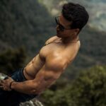 Tiger Shroff Instagram - Missing the mountains #soty2 #topoftheworld...almost