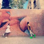 Vignesh Shivan Instagram - At the #KissWall #Barcelona 🥰😍❤️ Barcelona, Spain