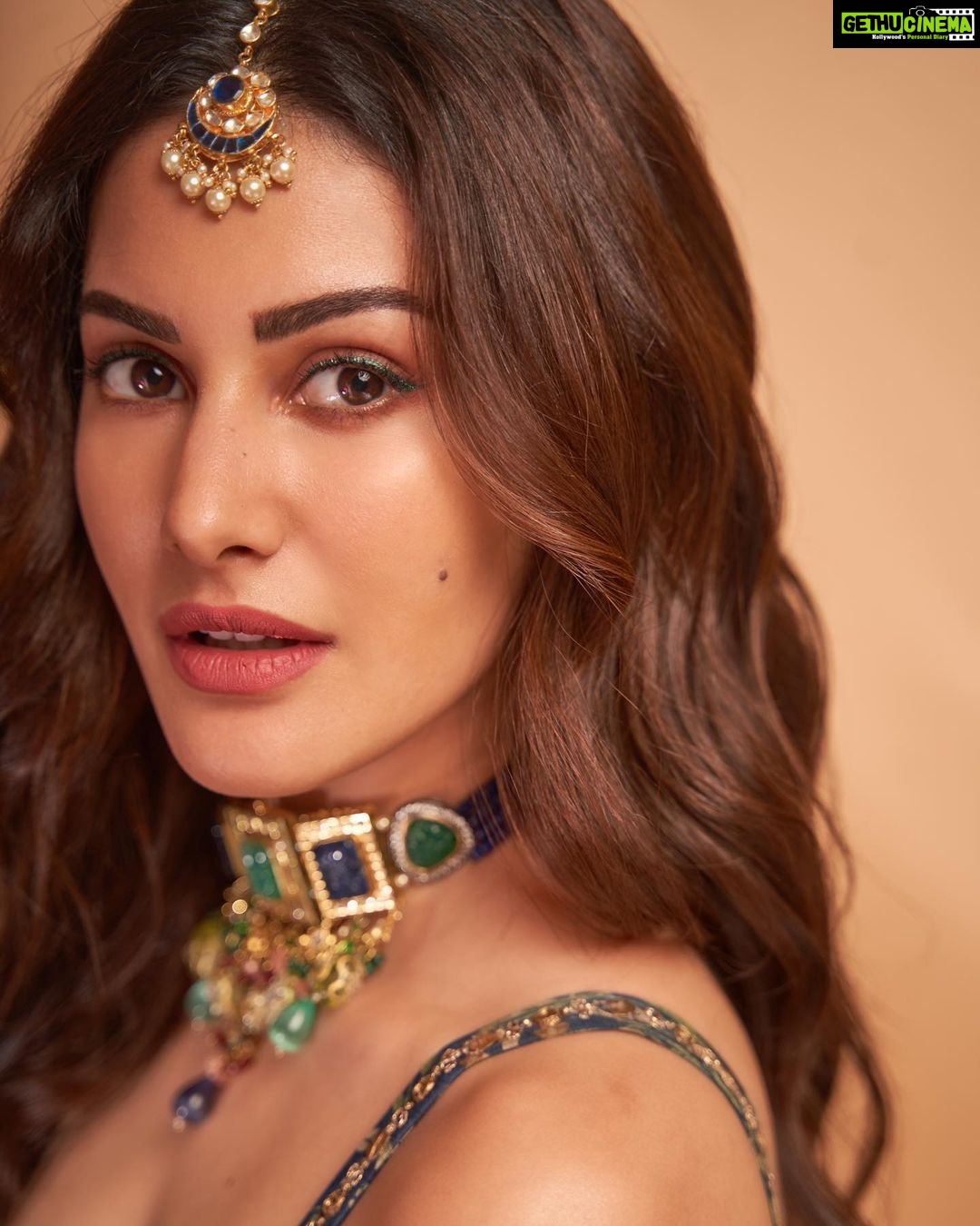 Amyra Dastur - 200.5K Likes - “Glamor is shine and confidence”
.
Wearing @paulmiandharsh
Jewellery @minerali_store
Styled by @malvika_tater
Hair @hairstylist_madhav2.0
Shot by @dieppj
.
.
.
#thegreatindianwedding #riali #shaadi #shaadiseason #indianwedding #desigirl #lehenga #indianwear #indianfashion