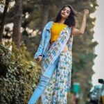 Deepthi Sunaina Instagram - Ditching the conventional style by giving a fun & modern spin to the traditional look by pairing saree with jeans, crop top & completing it with sneakers & a flashy denim jacket. Wear this to your best friend's sangeet to take on the contemparory vibe & go all out on the dance floor stress-free. Let me know what occasion would you prefer this look. Also, don't forget to check out @myntra fashionotasav collection to try out more options on my look. HURRY! Valid only until 15th of OCT - LINK In BIO. #MyntraFashionotsav #Myntra #LightUp #FestiveShopping #FestiveStyles . . . #galleri5InfluenStar PC: @mark_man_