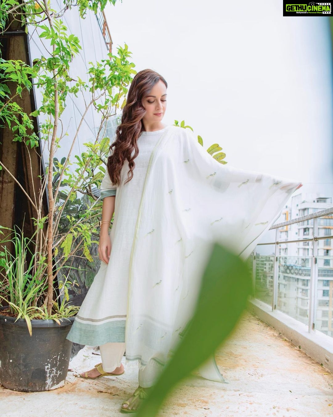 Dia Mirza Instagram - I have always loved wearing @anavila_m. Her clothes are in it’s truest essence #Sustainable. She cares for people and cares for the planet 🌏🌻🐯🕊🦋 This set is a part of Anavila’s quiet collection. Made using handwoven linen textile from West Bengal, the yarn dyed stripes are vegetable dyed. A 100 percent natural and sustainable. The simple kurta design is reflective of Anavila’s “quiet“ aesthetic with raglan sleeves fagetted in a contrast color. I personally love the motif of birds on the dupatta, an ode to the magical moments i spend witnessing natures quiet gifts to us in the city 💚 🦜 #IAmNature #GlobalGoals #SDGs #OnePeopleOnePlanet MUH by me 🙃 Styled by @theiatekchandaney Assisted by @jia.chauhan Jewellery from my personal collection. Photos by @rishabhkphotography Managed by @shruti8711 @exceedentertainment Bandra World of Storytellers