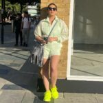 Huma Qureshi Instagram – Soaking the London Sun ☀️ #Neon is the new #Black like my #coffee