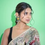 Jennifer Winget Instagram - Sliding into the festive mood with six yards of grace. Happy Ganesh Chaturthi everyone!🙏 Saree: @rohitbalofficial Jewellery : @curiocottagejewelry Stylist: @natashaabothra Assisted: @simstyles20 @teamnatashaabothra 💄 : @sonamvaghani.mua 💆‍♀️ : @hairbysharda 📸: @rishabhkphotography