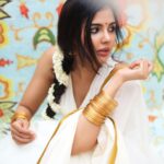 Kalyani Priyadarshan Instagram - Happy Onam everybody !!!! 🤍💛🧡
