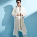 Karan Johar Instagram - The power of White light! In @farazmanan styled by @ekalakhani 📷 @rahuljhangiani