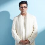 Karan Johar Instagram - The power of White light! In @farazmanan styled by @ekalakhani 📷 @rahuljhangiani