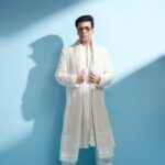 Karan Johar Instagram - The power of White light! In @farazmanan styled by @ekalakhani 📷 @rahuljhangiani