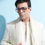Karan Johar Instagram - The power of White light! In @farazmanan styled by @ekalakhani 📷 @rahuljhangiani